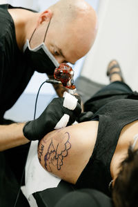 Close-up of man holding hands