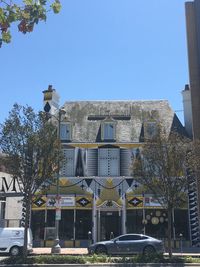 Low angle view of buildings against clear sky