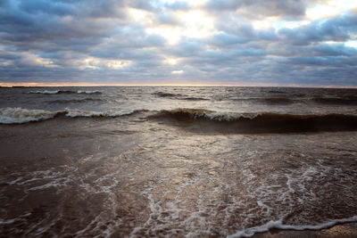 Scenic view of beach against sky