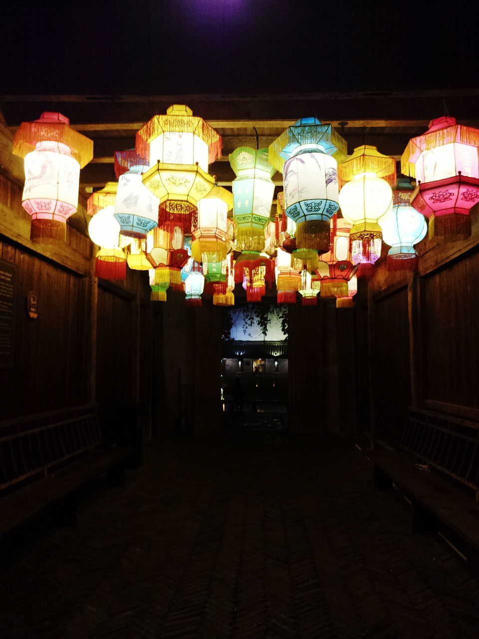 illuminated, night, lighting equipment, built structure, architecture, lantern, religion, place of worship, spirituality, building exterior, decoration, street light, electric light, in a row, indoors, tradition, lamp, electric lamp, lit, light - natural phenomenon