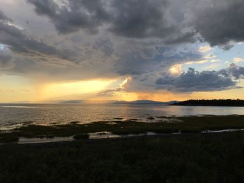Scenic view of sea against sky during sunset