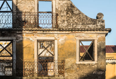 Low angle view of old building against sky