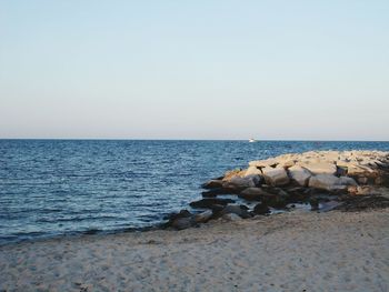 Scenic view of sea against clear sky