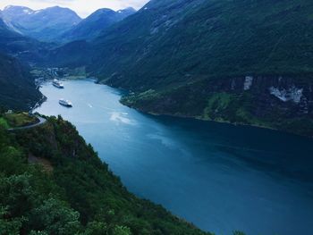 High angle view of river amidst mountains