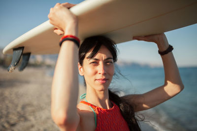 Portrait of young woman at beach