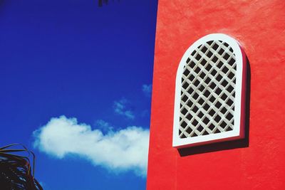 Low angle view of built structure against blue sky