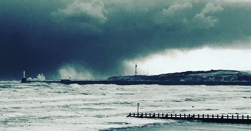 Panoramic view of sea against sky during winter