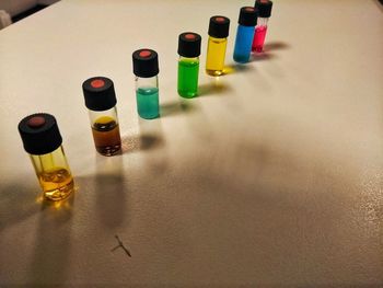 High angle view of bottles on table