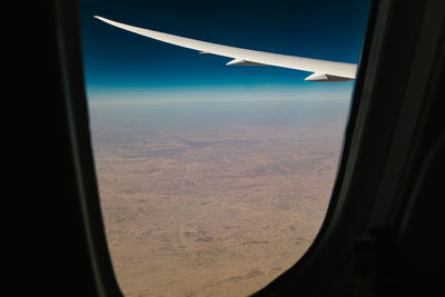 Cropped image of airplane wing