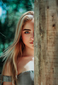 Portrait of woman in tree