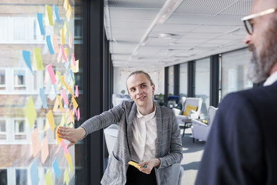 Coworkers having meeting in office