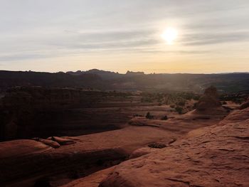 Scenic view of landscape against sky during sunset