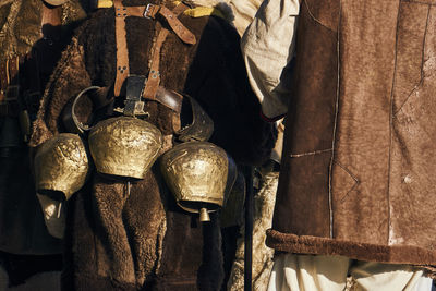 Close-up of clothes hanging on metal