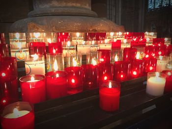 Close-up of illuminated tea light candles