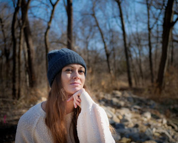 Portrait of young woman in hat