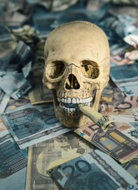 Close-up of human skull on table