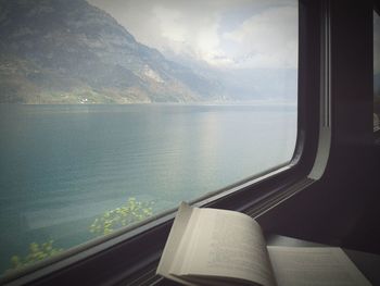 View of mountain range against cloudy sky
