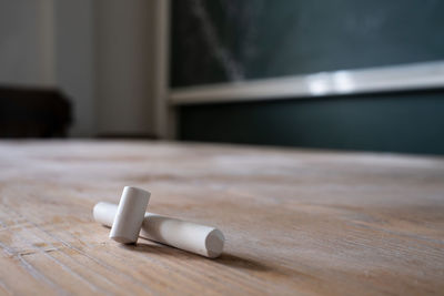 Close-up of wooden block on table