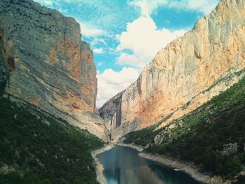 Scenic view of rocky mountains against sky