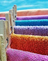 Detail shot of pegs on towels