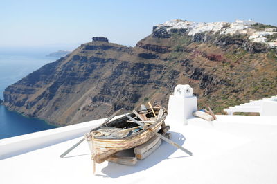 Old wooden boat on building terrace