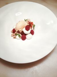 High angle view of ice cream in plate on table