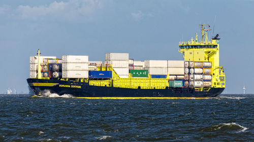 View of ship in sea against sky