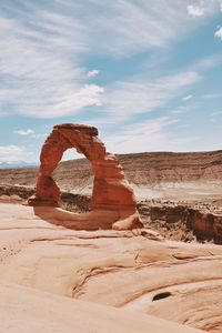 Scenic view of delicate arch against sky