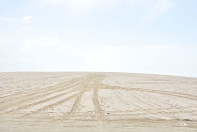 Scenic view of desert against sky