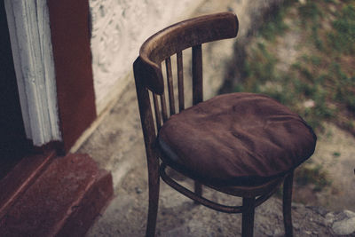 Close-up of empty chair on table at home