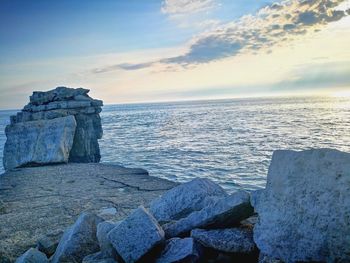 Scenic view of sea against sky during sunset