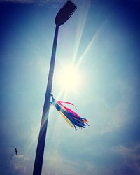 Low angle view of flag against sky