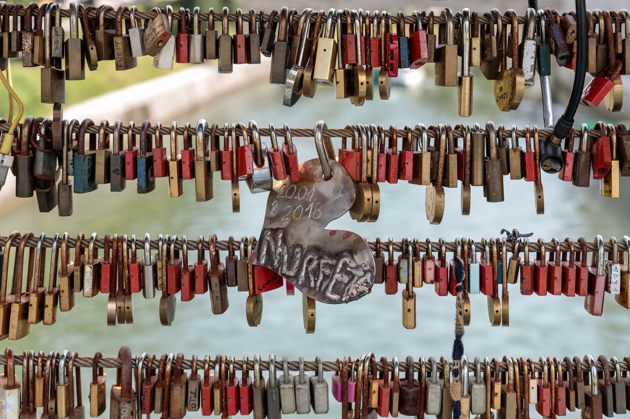 hanging, large group of objects, variation, abundance, no people, retail, padlock, day, tradition, in a row, lock, store, market