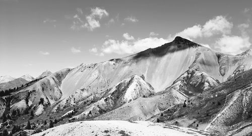 Scenic view of mountains against sky during winter