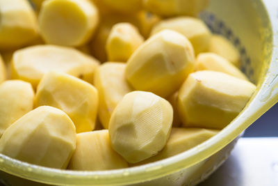 Close-up of boiled potatoes in container