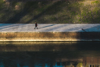 Full length of man on lake