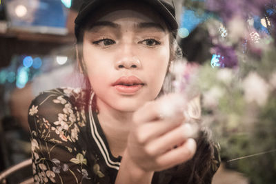 Close-up portrait of young woman