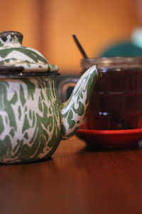 Close-up of tea cup on table