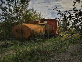 Abandoned truck on field