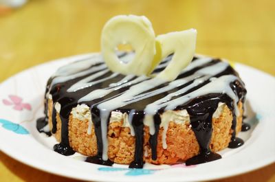 Close-up of cake in plate on table