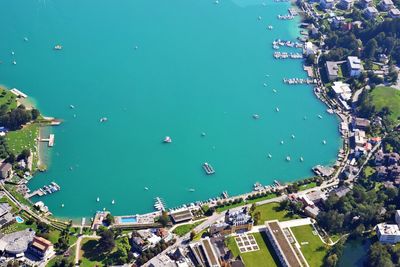 High angle view of buildings and sea in city