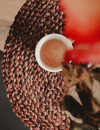 High angle view of coffee cup on table