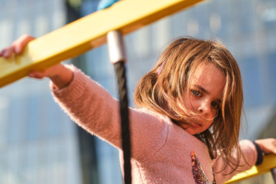 Young girl playing in the park