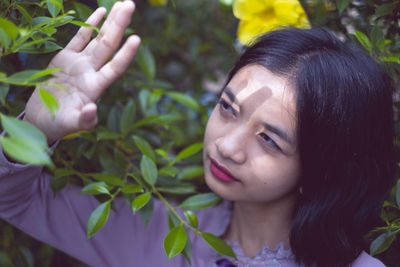 Close-up portrait of young woman