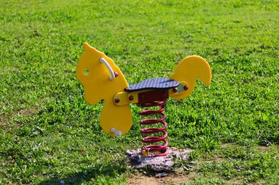 Close-up of toy on field