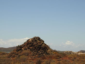 Scenic view of rocky mountain against sky