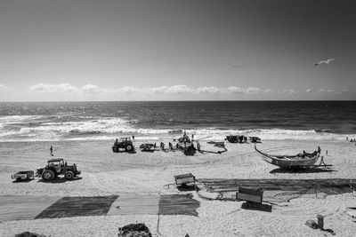 High angle view of vehicles on sand at beach