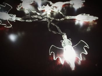 Close-up of illuminated lighting equipment
