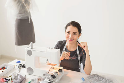 Portrait of a smiling woman working