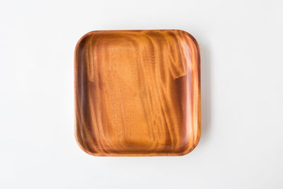 High angle view of bread against white background
